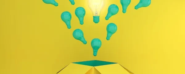 Light bulbs floating out of box