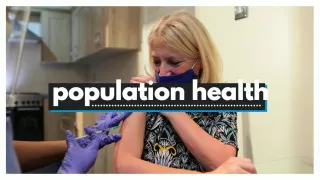 Population Helath video screenshot of woman receiving a vaccination