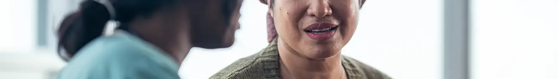 Two ladies talking to each other