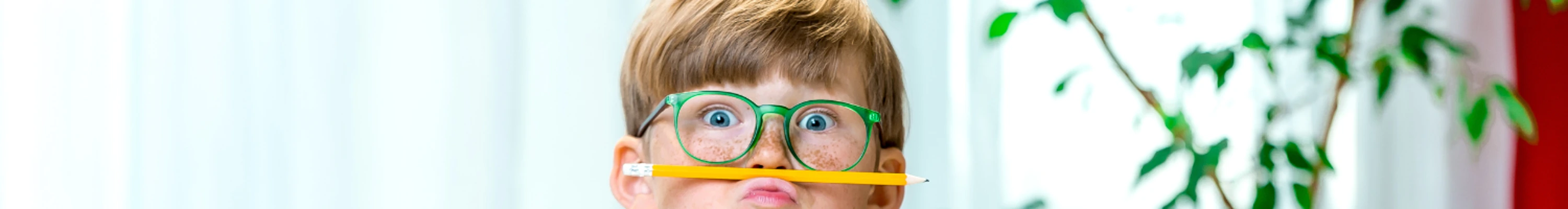 Boy With Pencil And Glasses Banner
