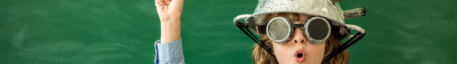 child wearing think helmet and goggles