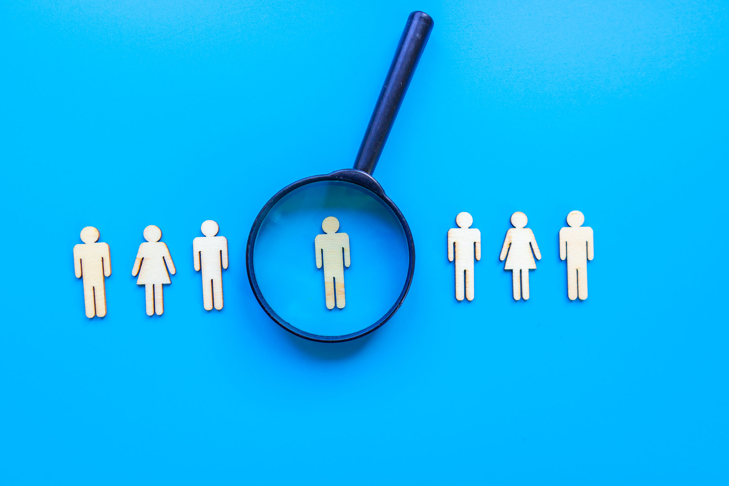 Magnifying Glass On People Blue Background NL
