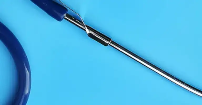 Blue stethoscope attached to computer mouse blue background resized