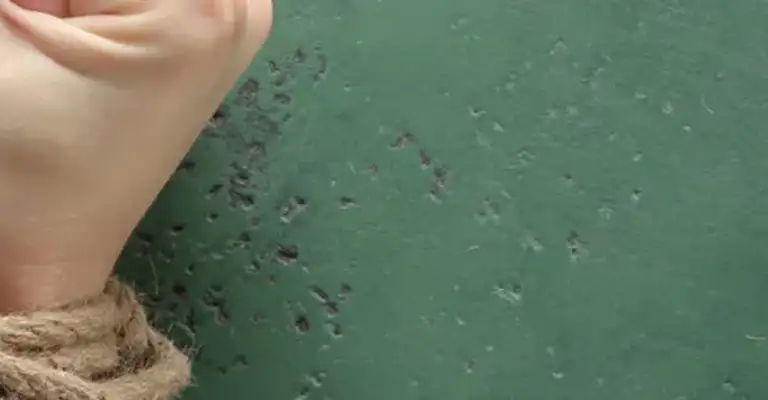 Hands tied with rope