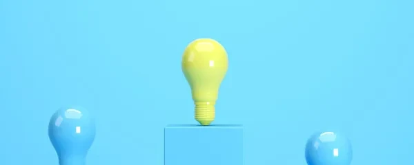 yellow bulbs on a podium blue background
