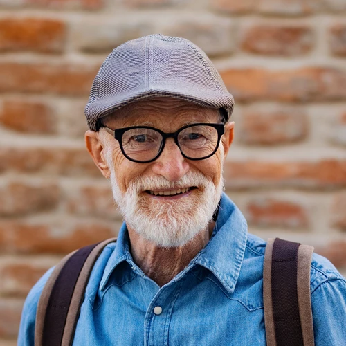 Cool Older Man With Tablet Outdoors Website 2