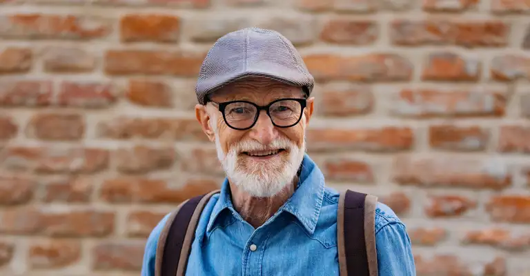 Cool Older Man With Tablet Outdoors Website 2