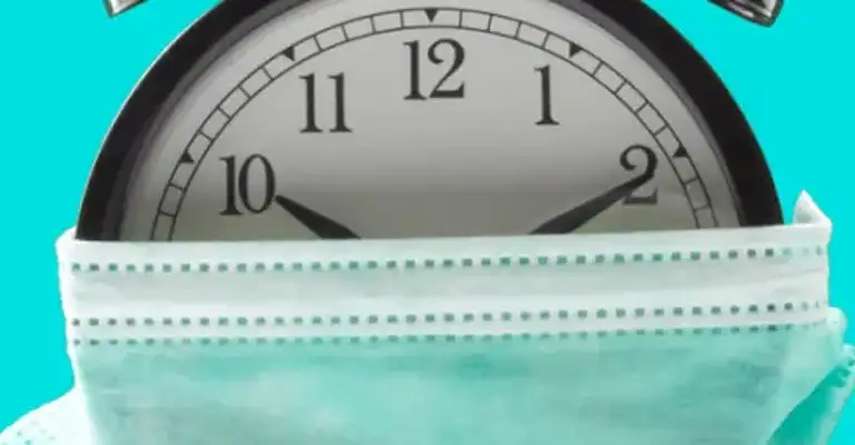 Clock with face mask around it