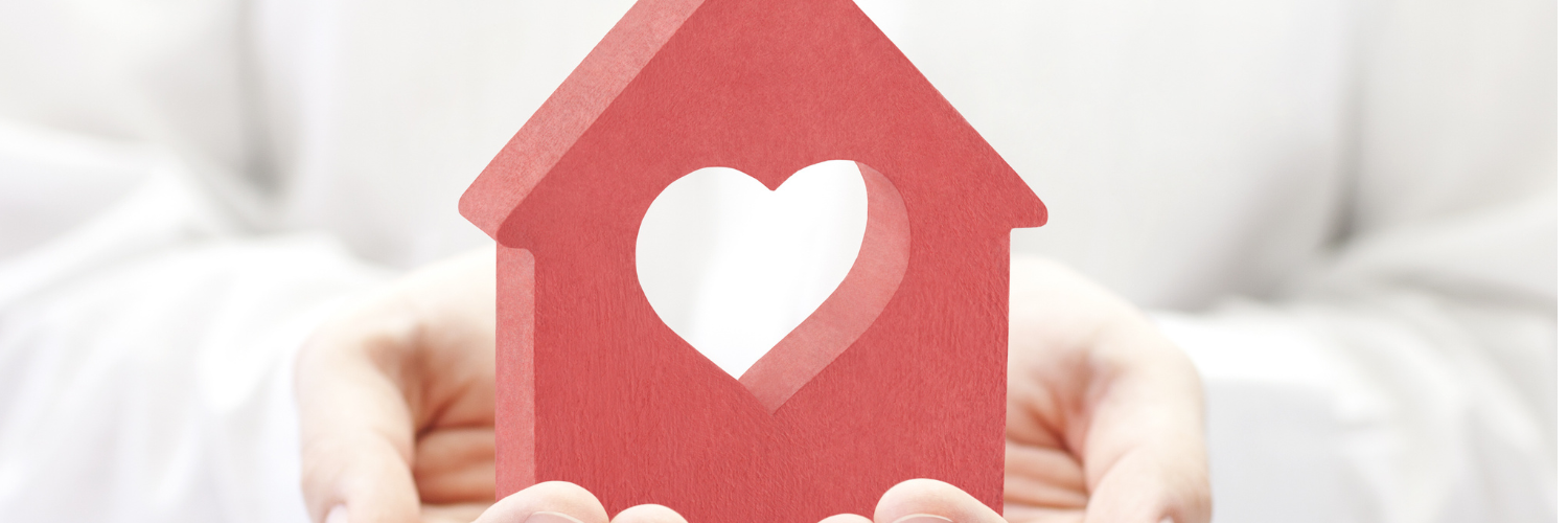 V2 Wooden House In Hands Heart Cut Out Banner