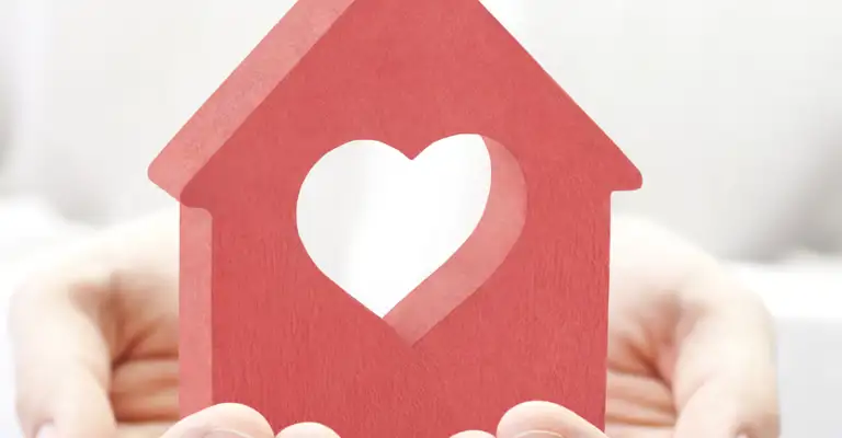 V2 Wooden House In Hands Heart Cut Out Banner