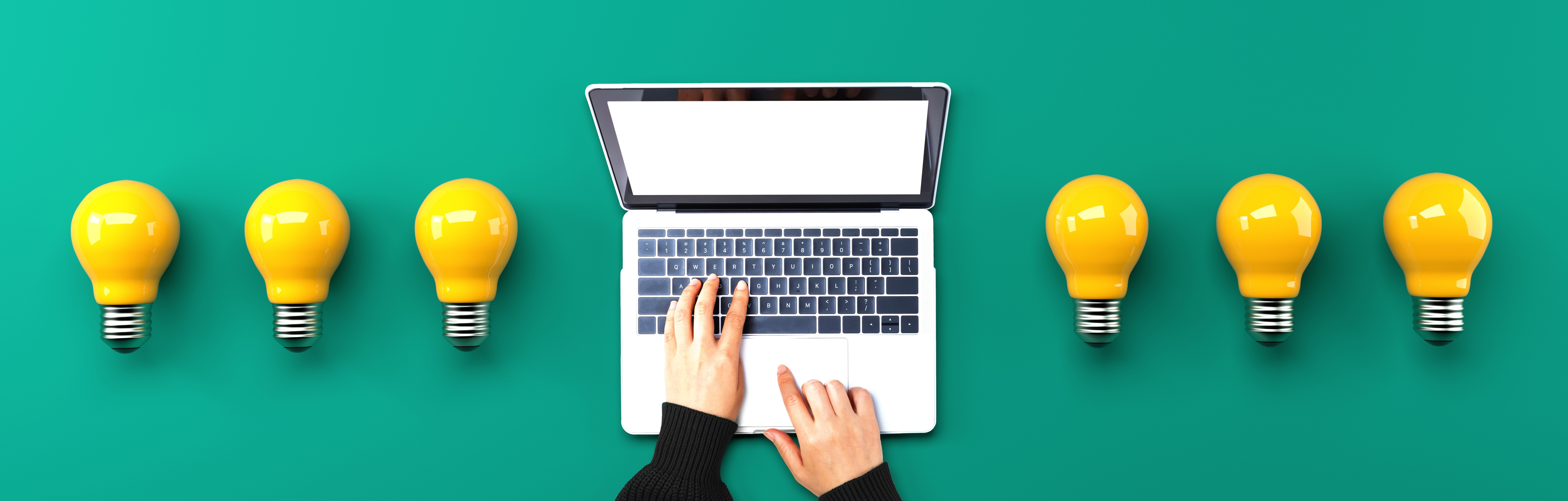 Laptop And Lightbulbs Web